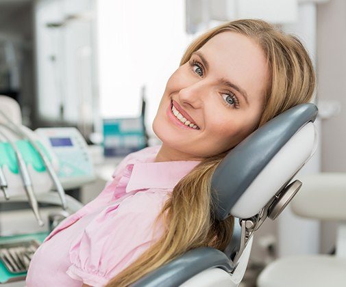 Woman in dental chair for wisdom tooth removal