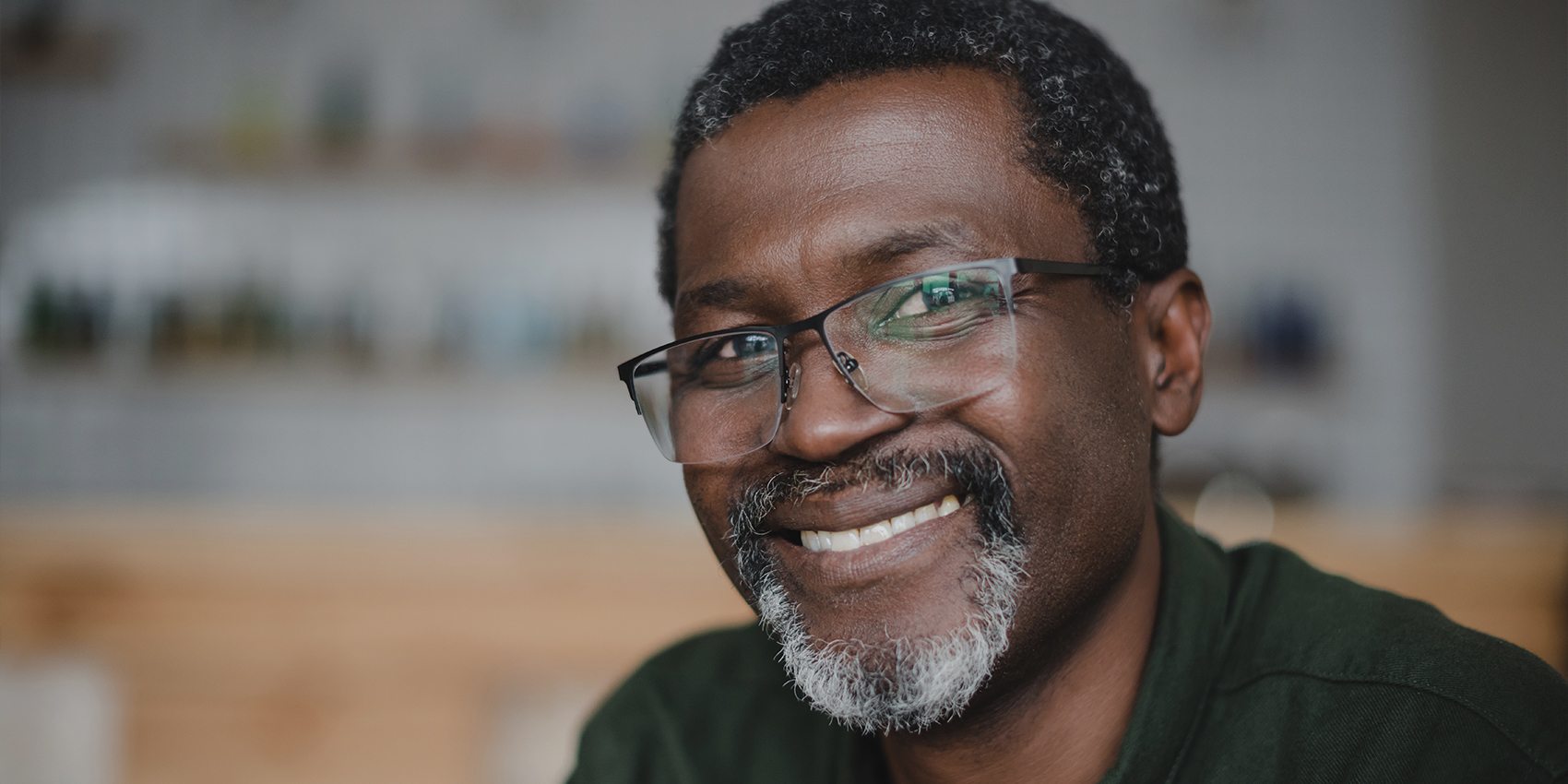 Man sharing healthy smile after wisdom tooth removal