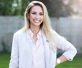 Young woman smiling after sedation dentistry